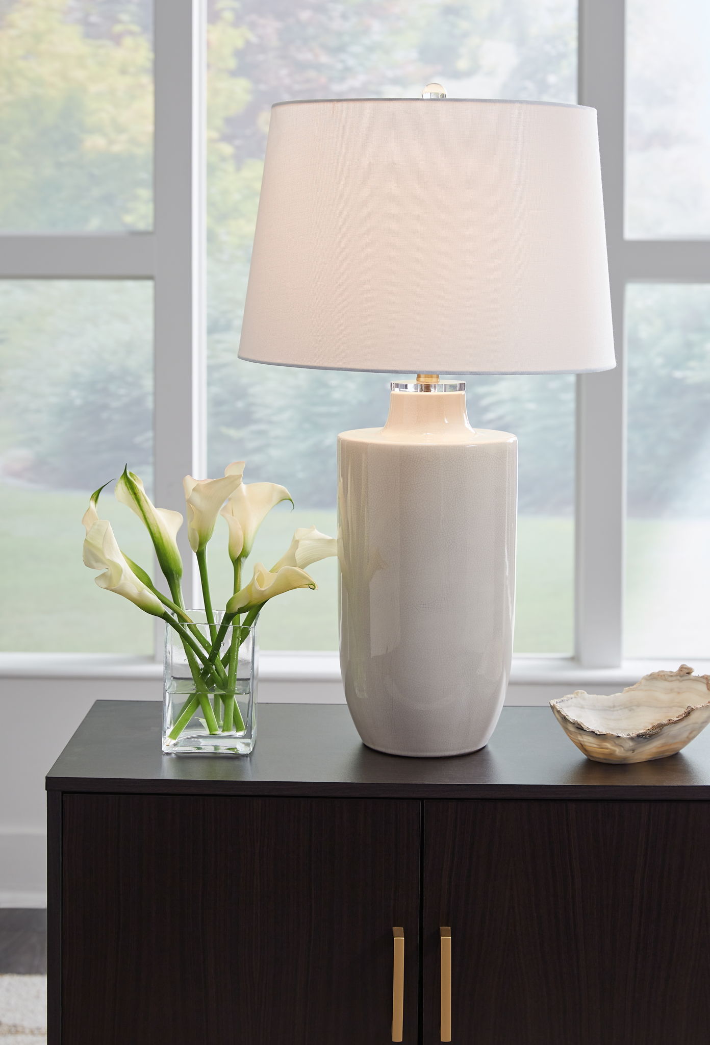 Cylener - Off White - Ceramic Table Lamp - Hornell Furniture Outlet